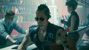 Dino waiting at his bar.jpg